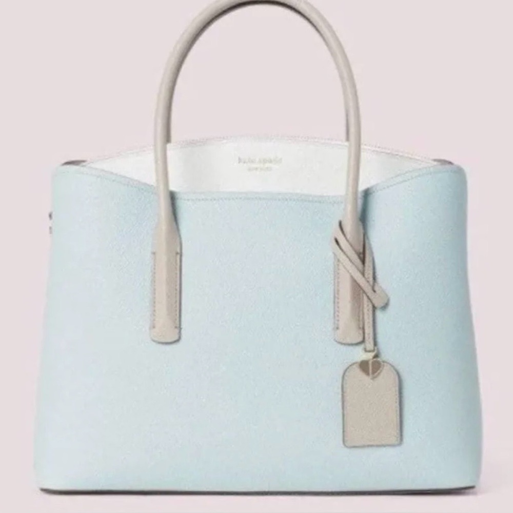 Kate Spade Margaux  color: Cloud Mist NWT and protective padding, never used.